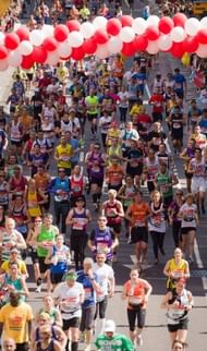 Runners head along the course toward Westminster during the 2013 London Marathon in central London on April 21, 2013